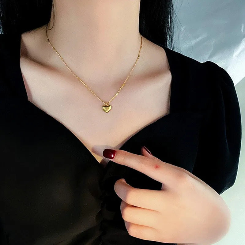 Gold Necklace with Heart Pendant